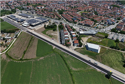 Büyükşehir Yazlık Kavşağı’nın trafik yükünü alacak duble yolda asfalt çalışmasına başladı